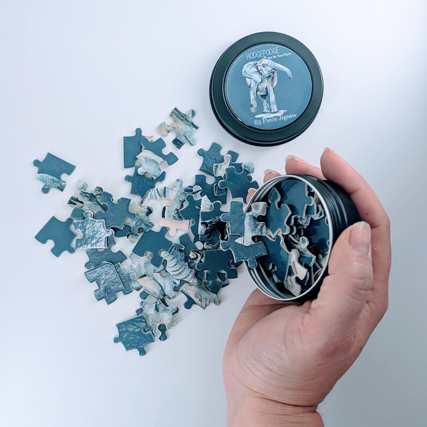 63 piece Elephant Jigsaw in a tin
