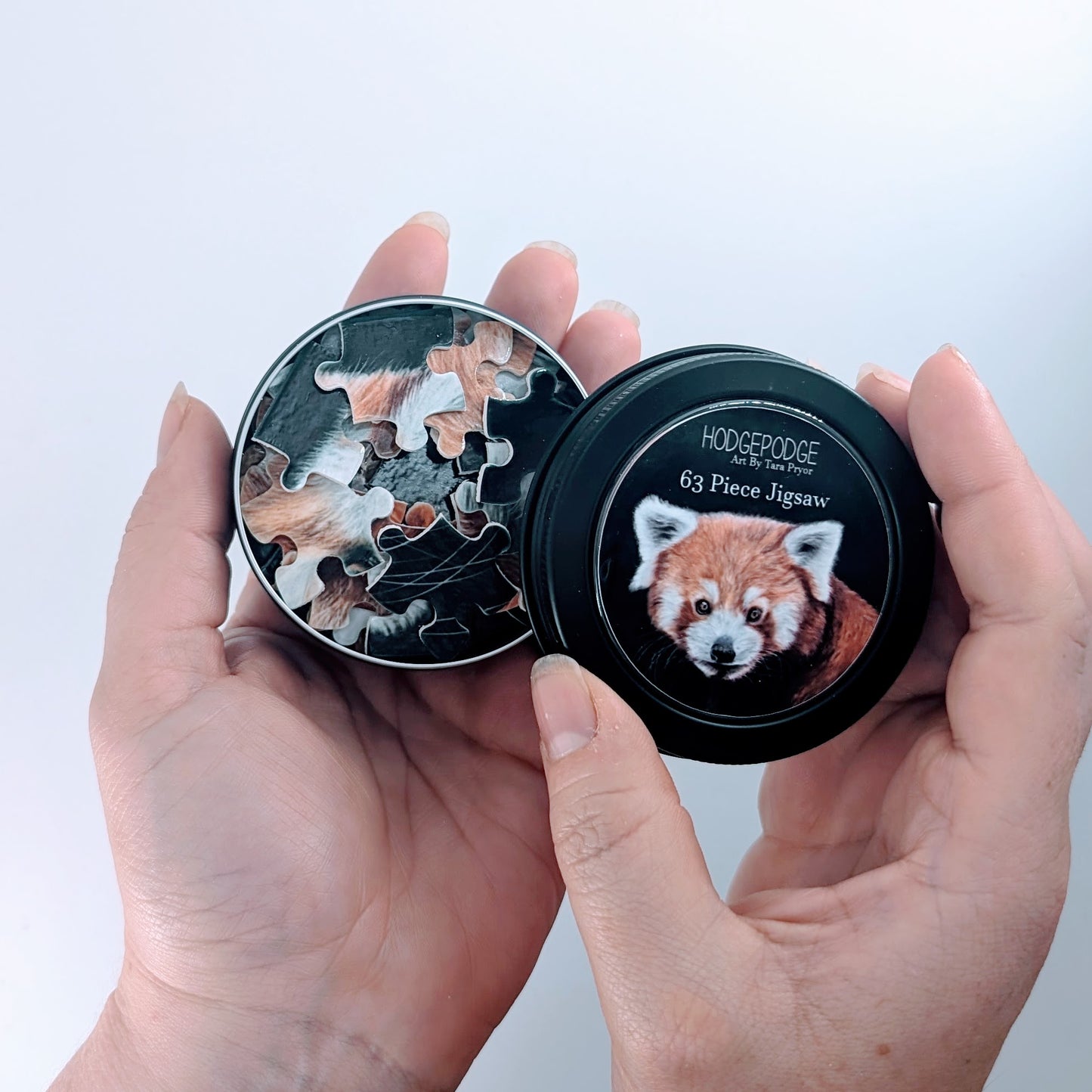 63 piece Red Panda Jigsaw in a tin