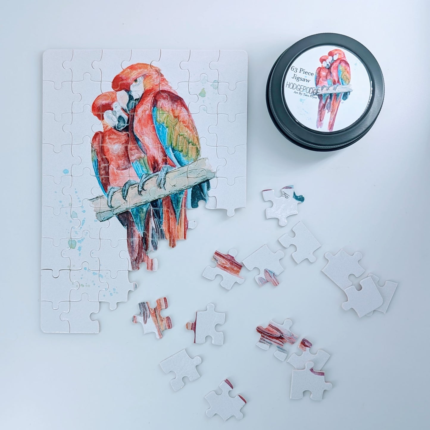63 piece Macaw Jigsaw in a tin