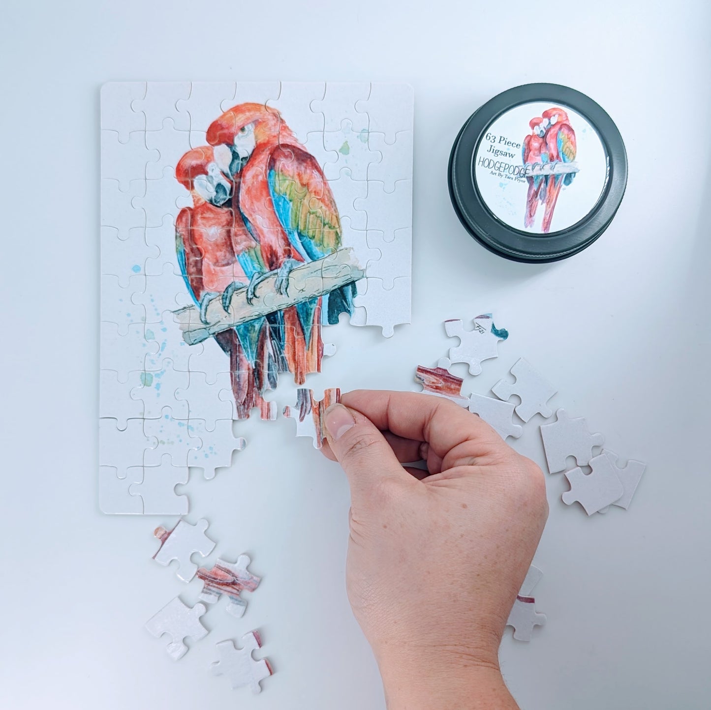 63 piece Macaw Jigsaw in a tin
