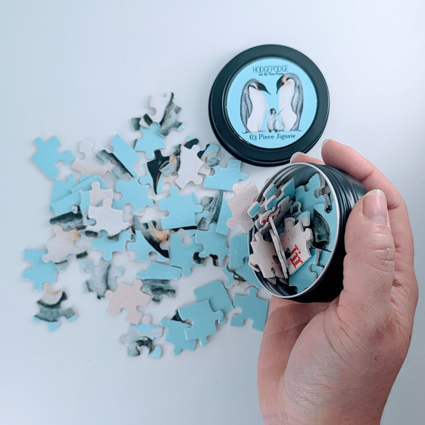 63 piece Penguins Jigsaw in a tin